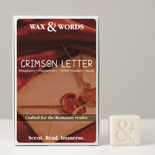 Wax & Words 'Crimson Letter' romance novel book cover shown upright next to a small white wax seal with an ampersand symbol, on a light gray background.