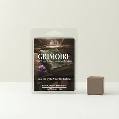 Grimoire wax melt packaging with a small brown cube on a white background