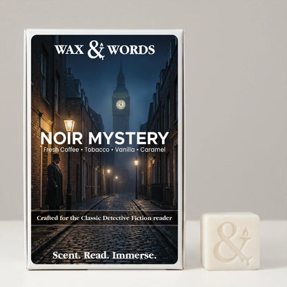 Wax & Words 'Noir Mystery' fragrance box shown upright next to a small off-white wax melt cube with an ampersand symbol, on a light gray background.