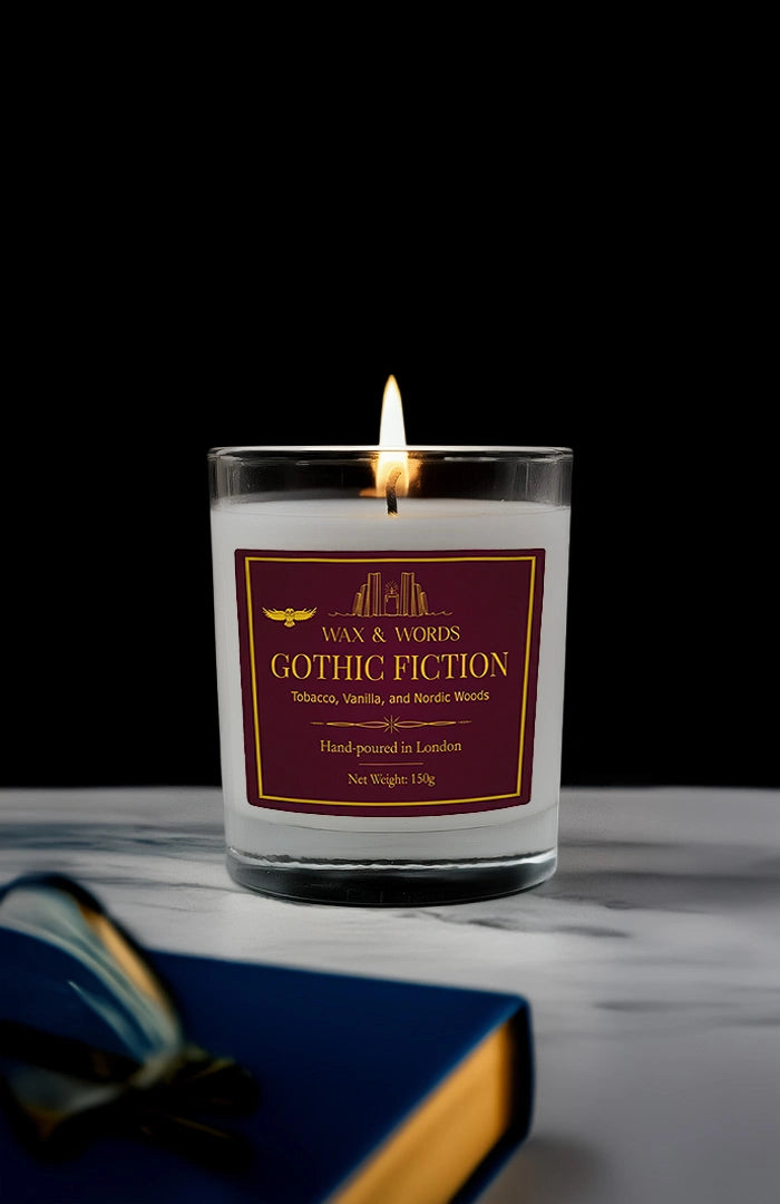 Candle in a glass jar with a label on a dark background